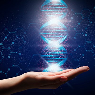 A hand is stretched out, holding a graphic image of a genetic sequence against a dark background.